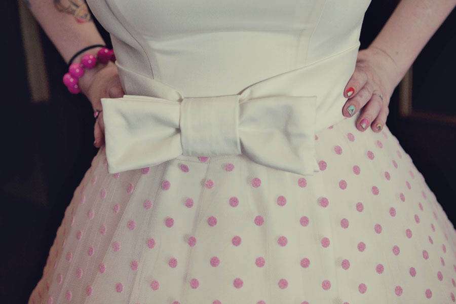 white dress with pink polka dots