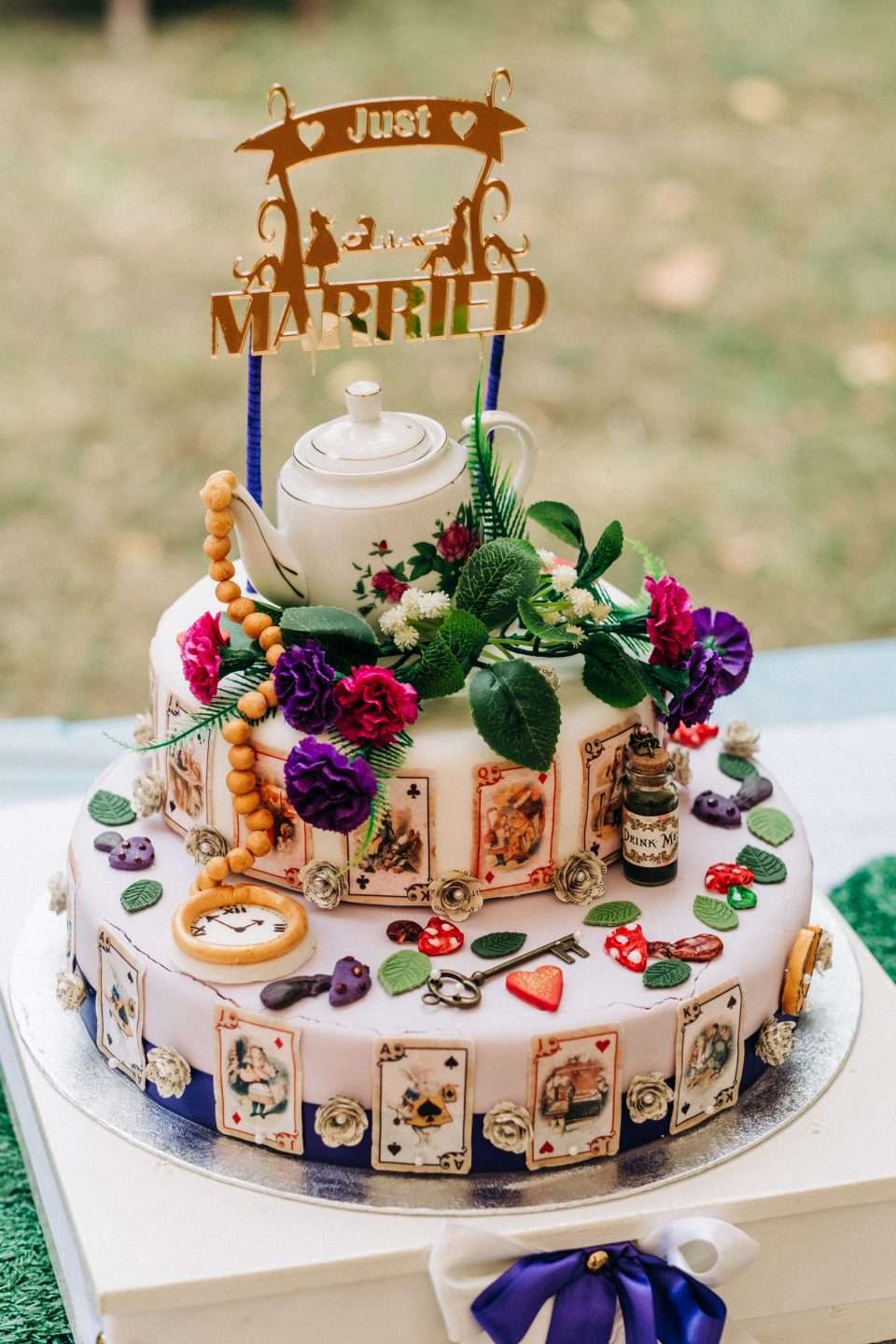 https://www.rocknrollbride.com/wp-content/uploads/2023/02/Alice-in-Wonderland-Picnic-Wedding-in-the-Woods-11-960x1440.jpg